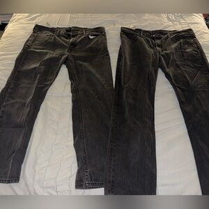 OBO. 2 pairs of black of Levi jeans. Size 38 waist. $60 for both